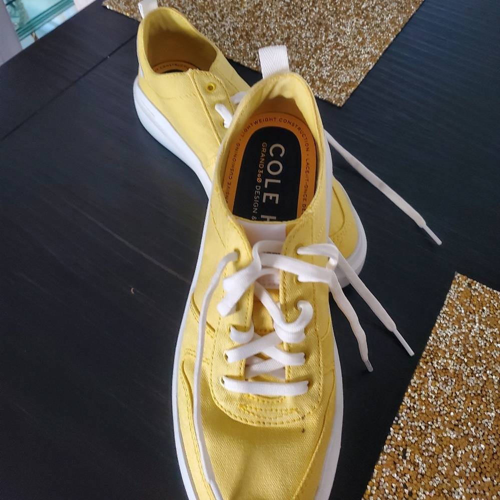 Yellow tennis shoes
